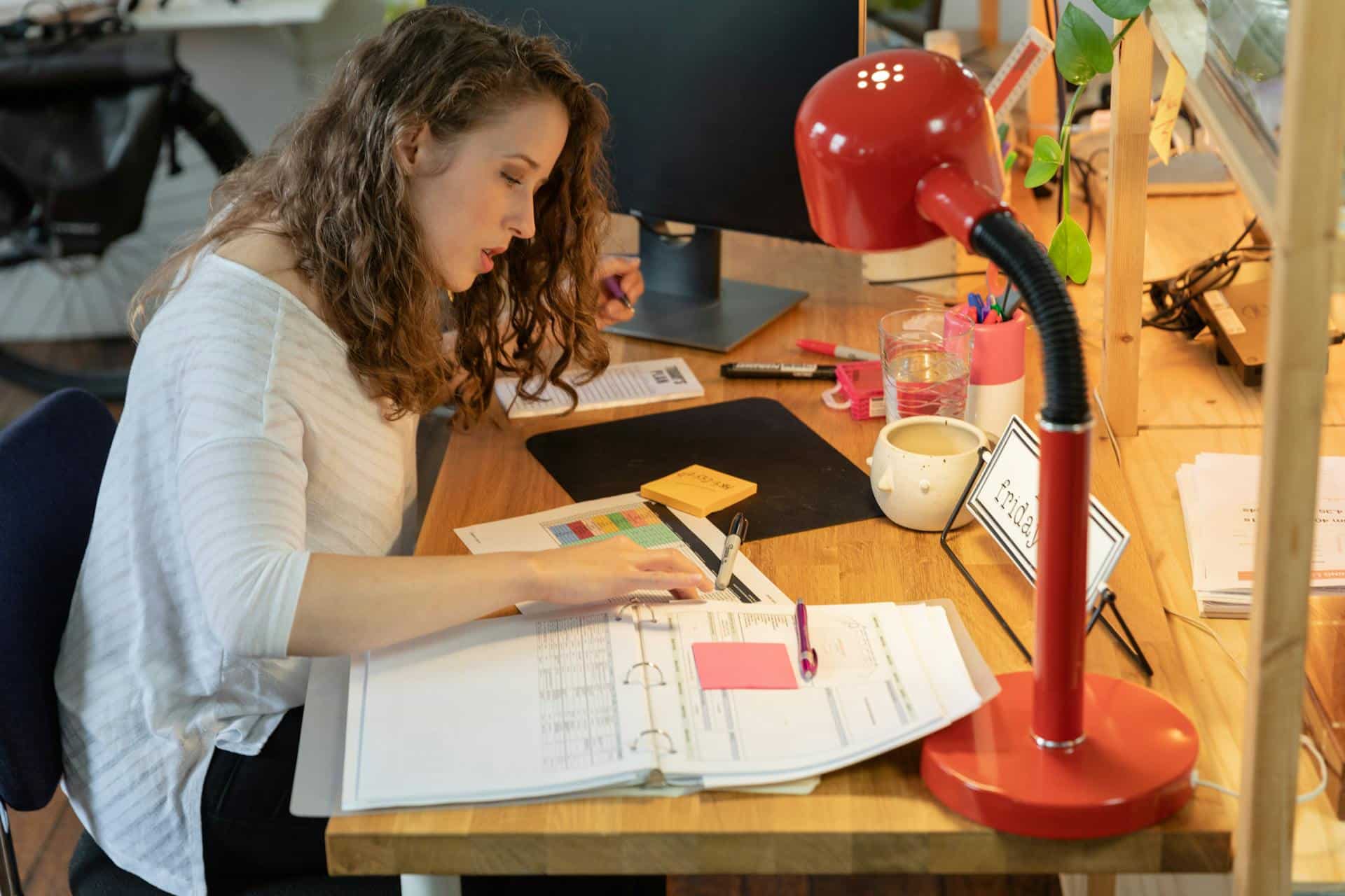 Woman reading through documents