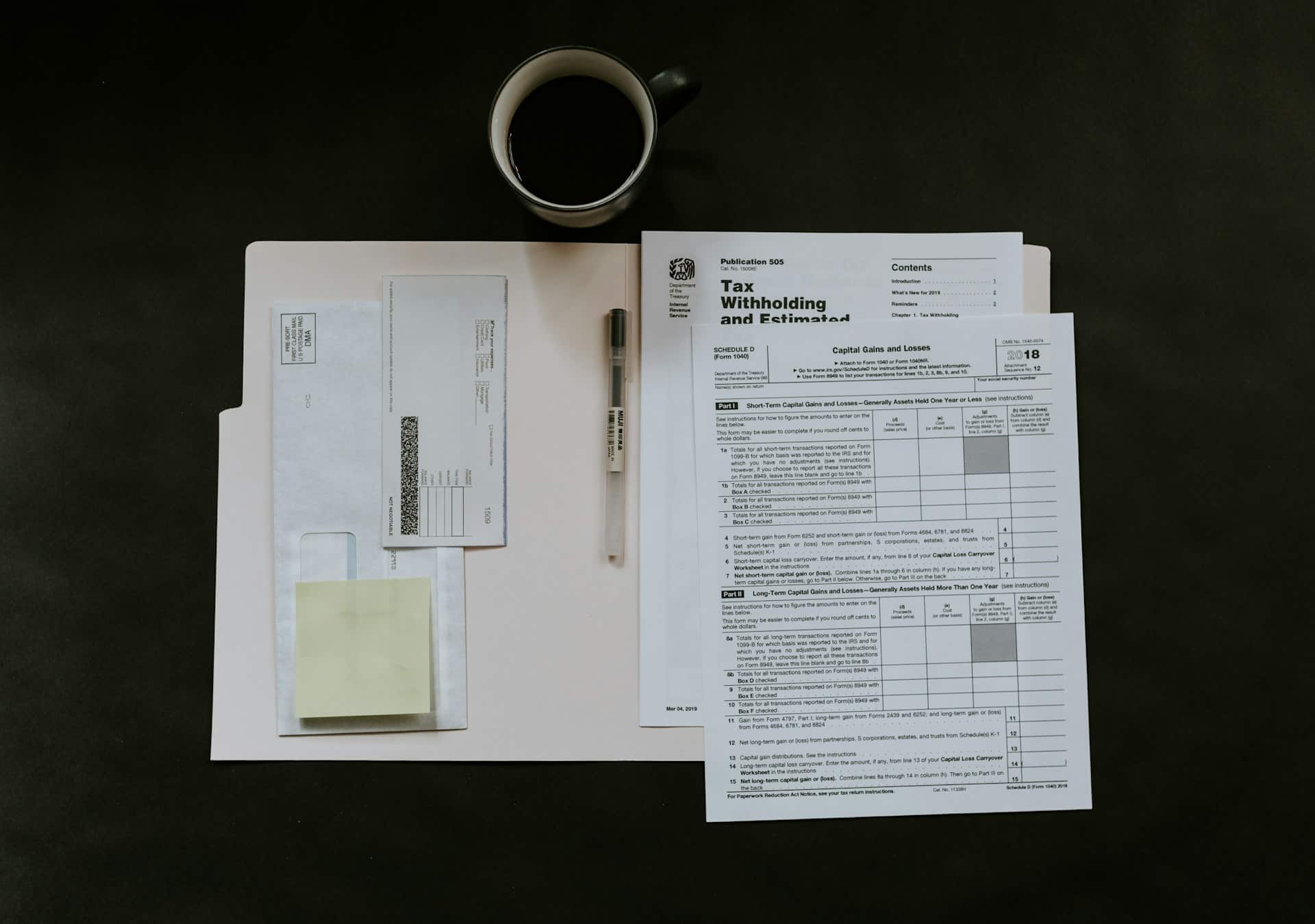 Tax forms and a cup of coffee