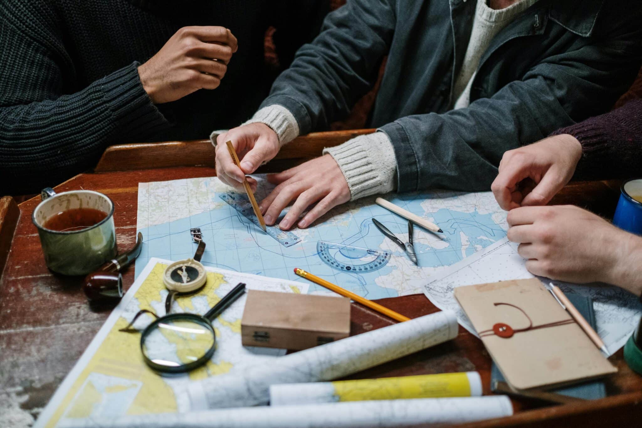 People identifying locations and drawing on a map