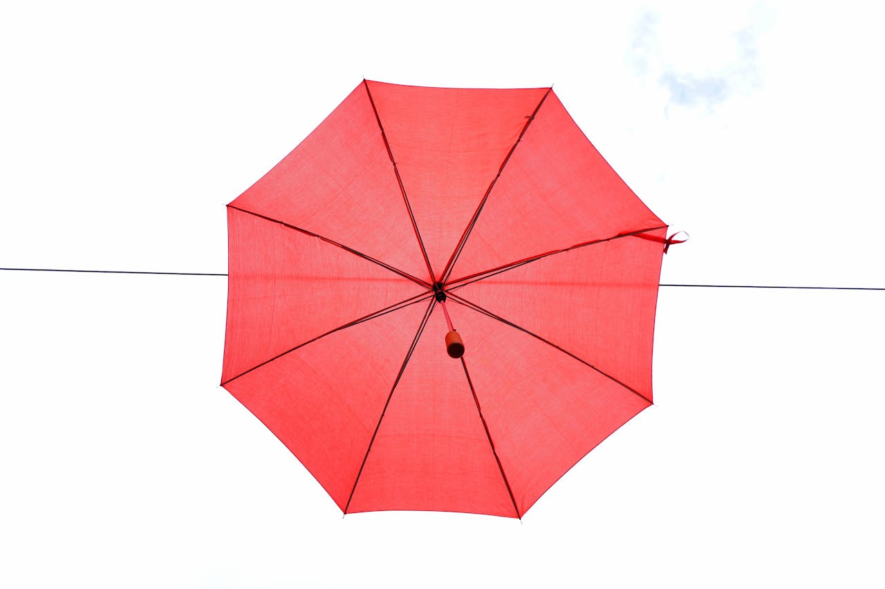Floating red umbrella