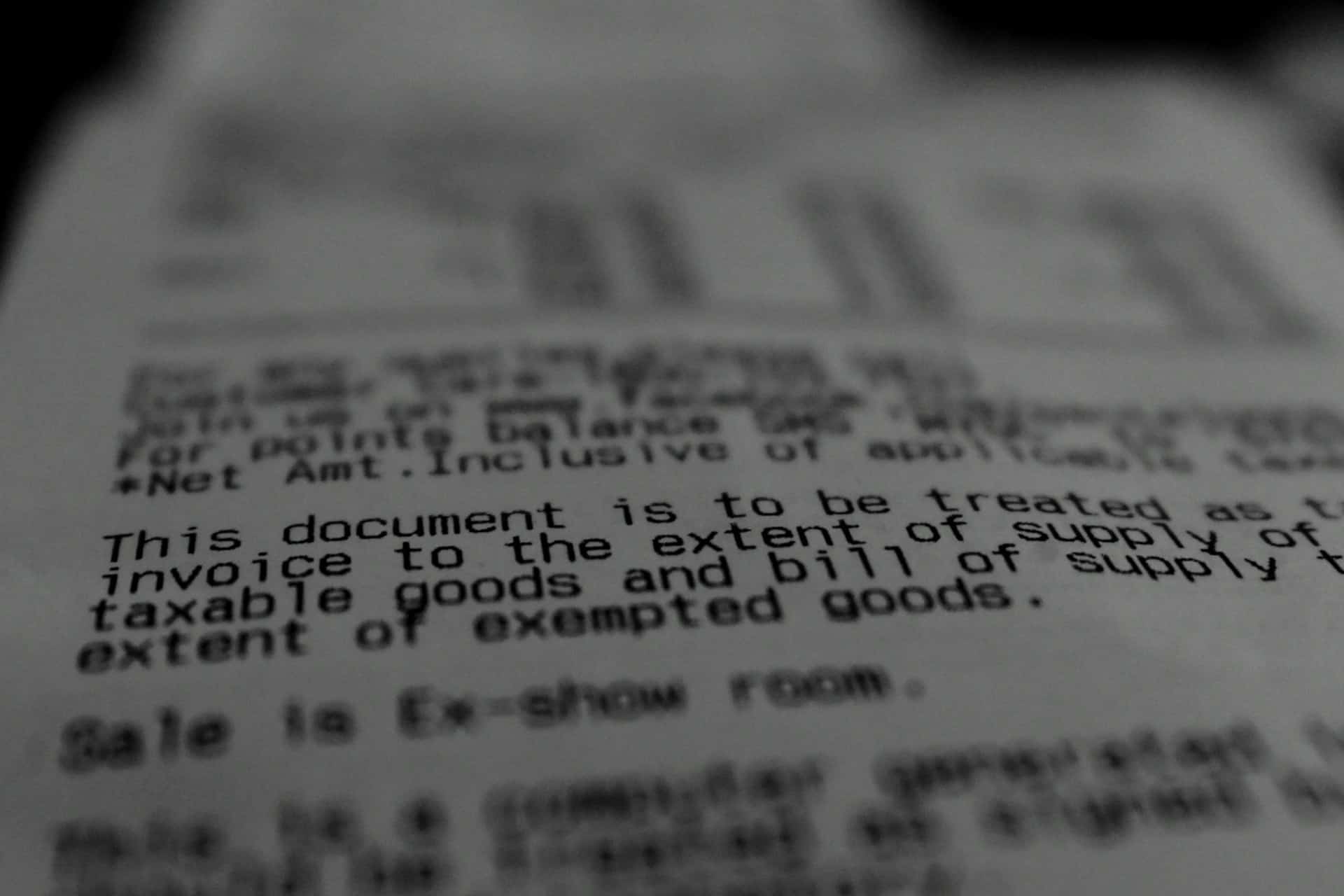 Close-up of a tax disclaimer on an invoice