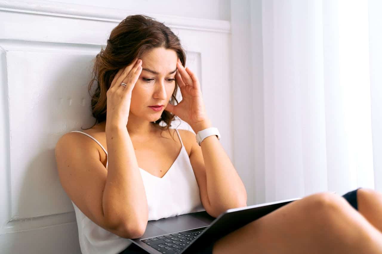 A stressed woman on her laptop

