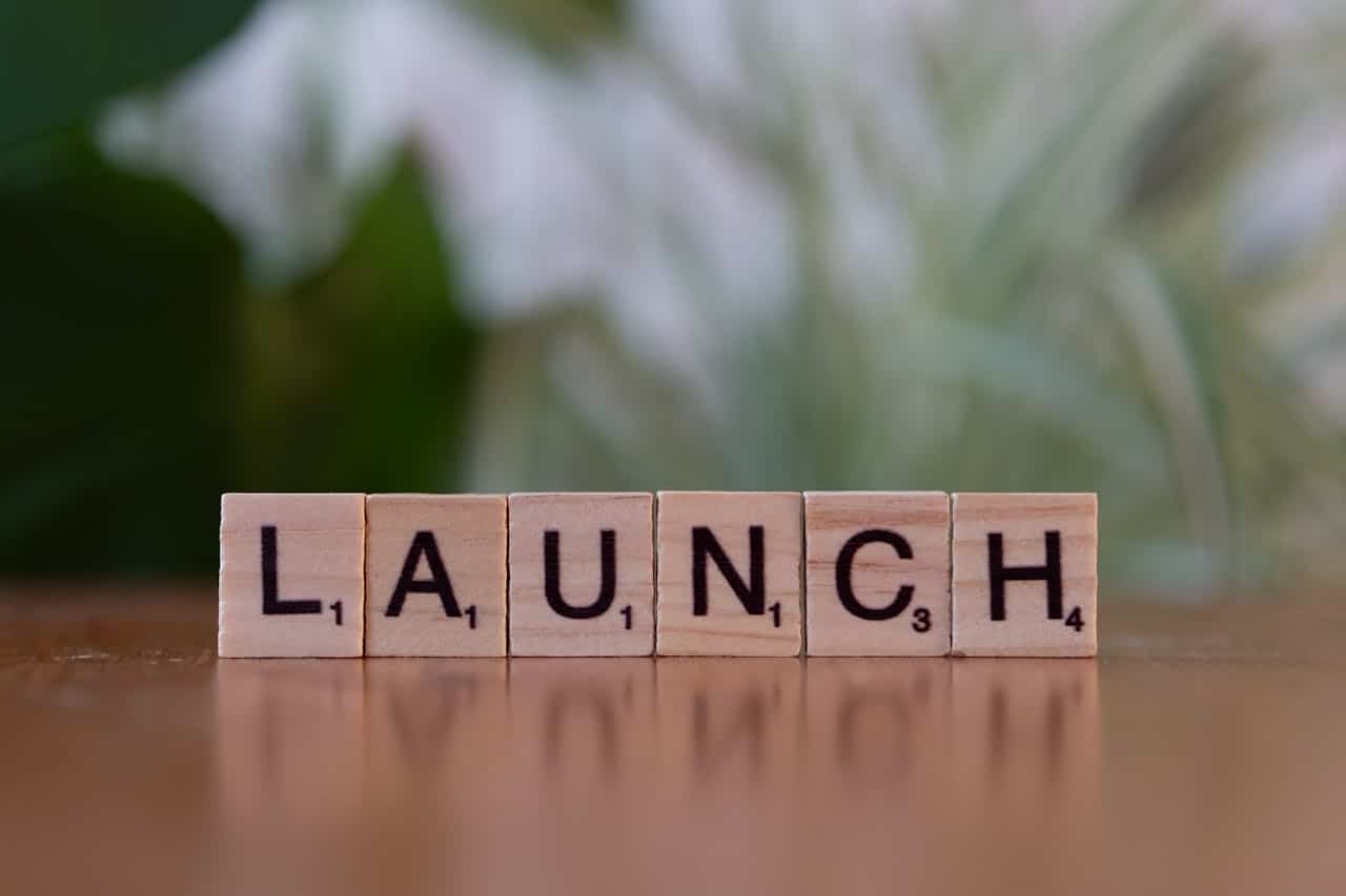 Scrabble tiles spelling Launch