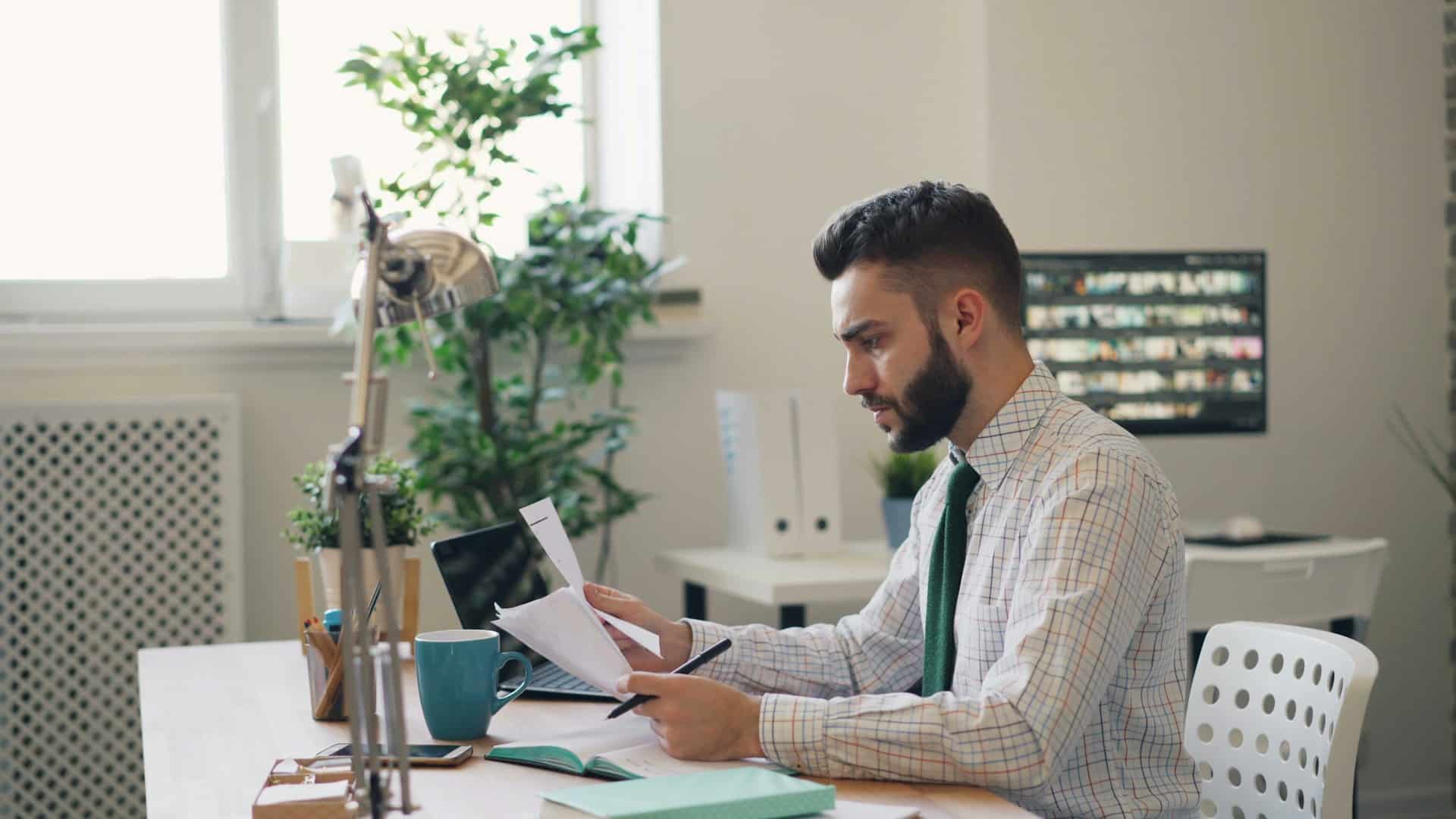 A man looking at documents