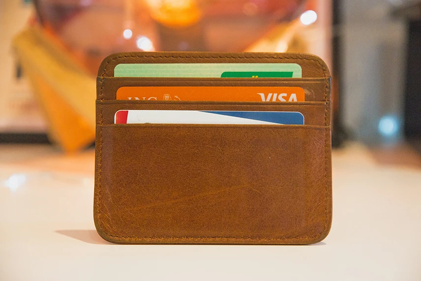 Bank cards placed on a leather wallet